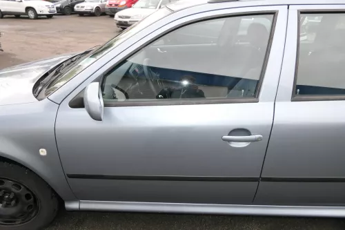 Skoda Octavia 1U Kombi + Limo Tür vorne links Fahrertür grau LF7U