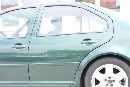 VW Bora Tür hinten links nur Limousine grün LC6M 1J5833055F