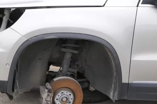 VW Tiguan Kotflügel vorne links original 5N0821105A + Leiste gelb beige LH1W (165929)