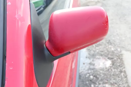 VW Polo 6N manueller manuell Spiegel Außenspiegel links mit Glas rot LP3G (168399)