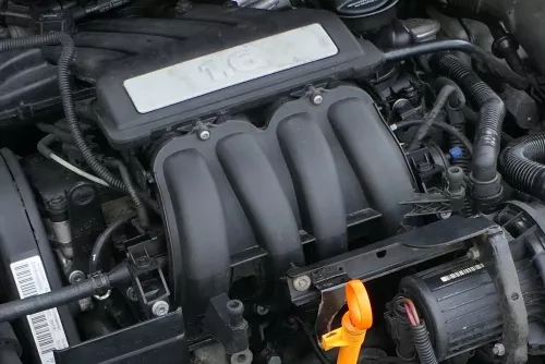 VW Golf 5 Caddy Ansaugbrücke Saugrohr 06A133203EM 1,6 75kw BGU BSE BSF