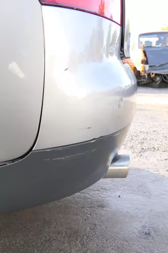 Audi A4 8E B6 Limousine Stoßstange hinten mit Spoiler grau LY7Q atlasgrau PDC (172050)