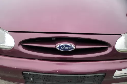 VW Sharan 7M Stoßstange Frontstoßstange vorne Nebelscheinwerfer Fleurie-Rot 93 (184821)