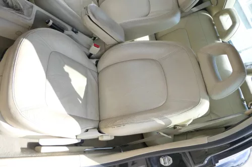 Q757 VW New Beetle 9C 1Y Sitz vorne links Fahrersitz Leder creme beige besch SHZ